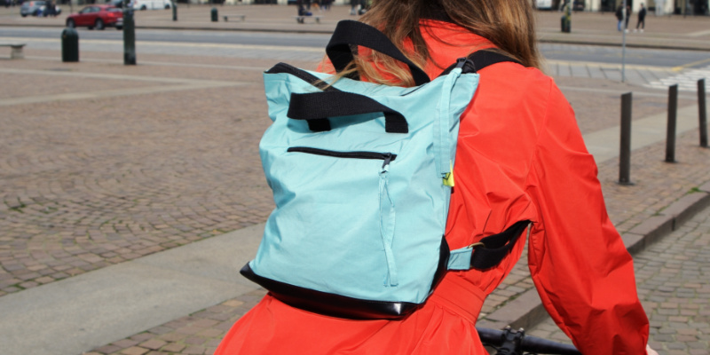 minty packback with virgi on a bike